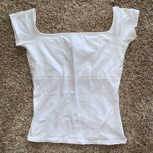 MODA INTERNATIONAL TEE